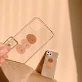 Funda transparente para teléfono con caniches triples marrones
